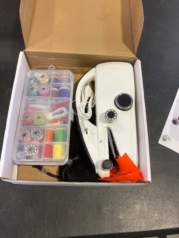 Photo 1 of Bearfire Handheld Sewing Machine Heavy Duty & Portable, 2-Speed Mini Sewing Machine with Sewing Kit & Storage Bag for Beginners, Adults, DIY, Home, Travel, Quick Clothing Repairs