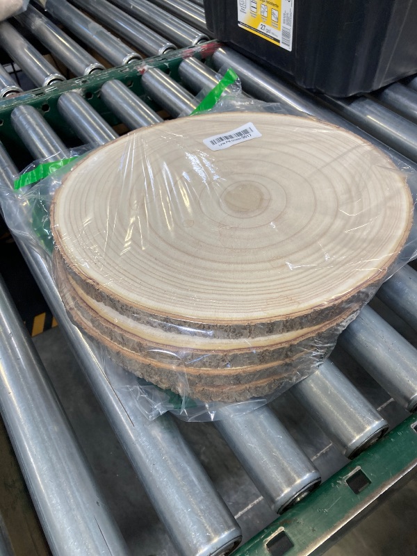 Photo 1 of Large Wood Slices 4 Pcs 12-14 Inches Wood Rounds Natural Wood Slices for Centerpieces/Display/Crafts/Painting/Table Decor/Wood Burning/DIY Projects/Christmas Ornaments