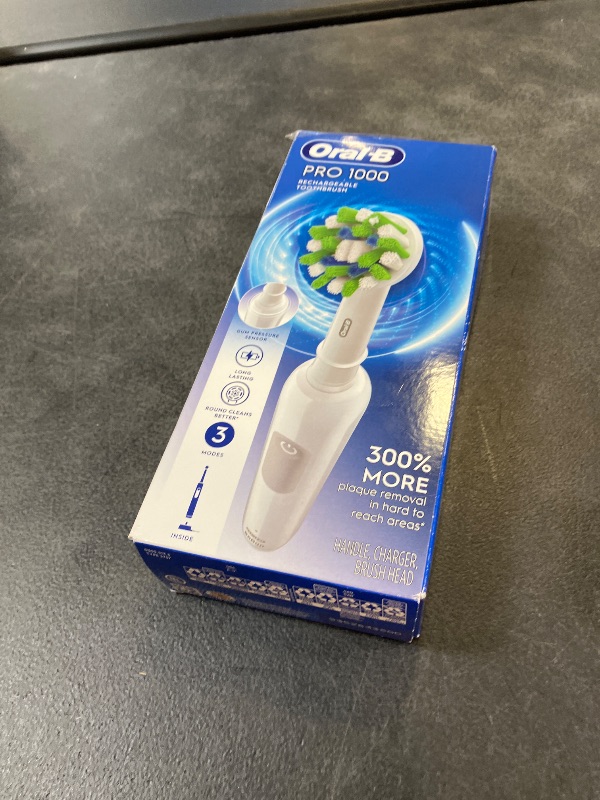 Photo 1 of Oral-B Pro 1000 Rechargeable Electric Toothbrush, White