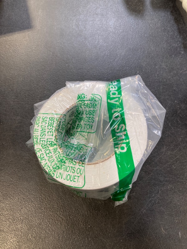 Photo 1 of Double Sided Rug Tape [2 Inch x 30 yd] Carpet Tape for Securing Area Rugs to Carpets, Laminate, and Hardwood Floors, Easy to Remove and Restick Without Residue or Damage to Rug or Floor