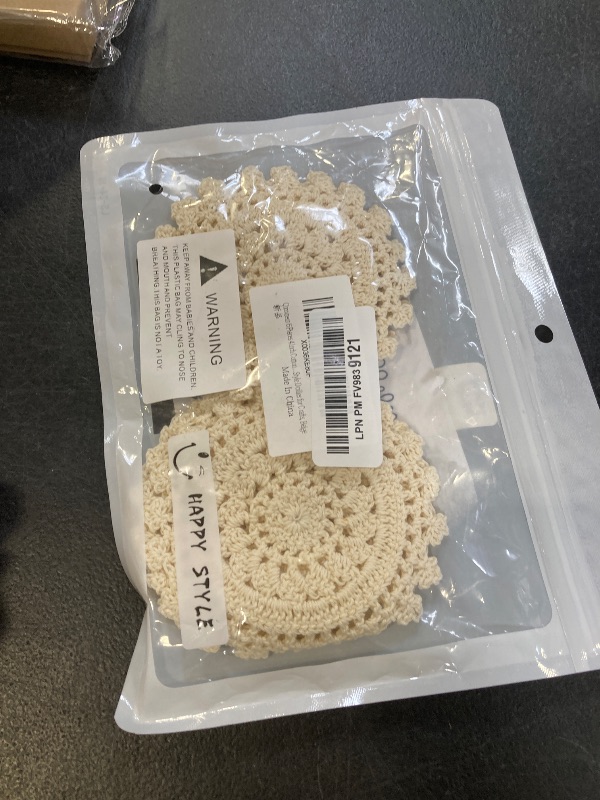 Photo 1 of Qxzvzem 6 Pieces 4 Inch Cotton Doilies, Small Vintage Cloth Lace Placemats, Crochet Mandala Round Coasters, Handmade Wagon Wheel Style Doilies for Crafts, Beige