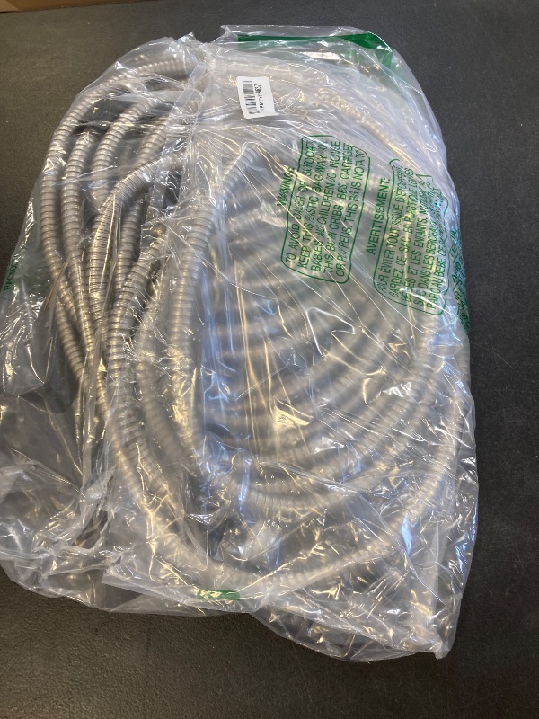 Photo 1 of METAL GARDEN HOSE- LENGTH UNKNOWN