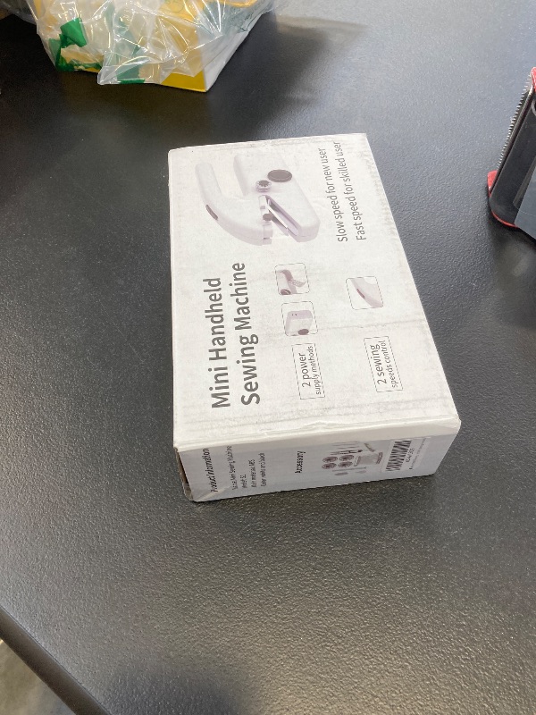 Photo 1 of Handheld Sewing Machine,Mini sewing machine,Easy to Use DIY Home Travel Electric Handheld Sewing Machine for Beginners.