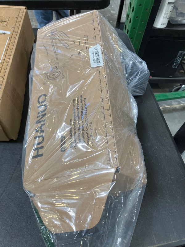 Photo 1 of HUANUO FlowLift™ Single Monitor Mount, 13 to 32 Inch Monitor Arm, Adjustable Monitor Stand, Vesa Mount with Clamp and Grommet Base - Fits 4.4 to 19.8lbs LCD Computer Monitors