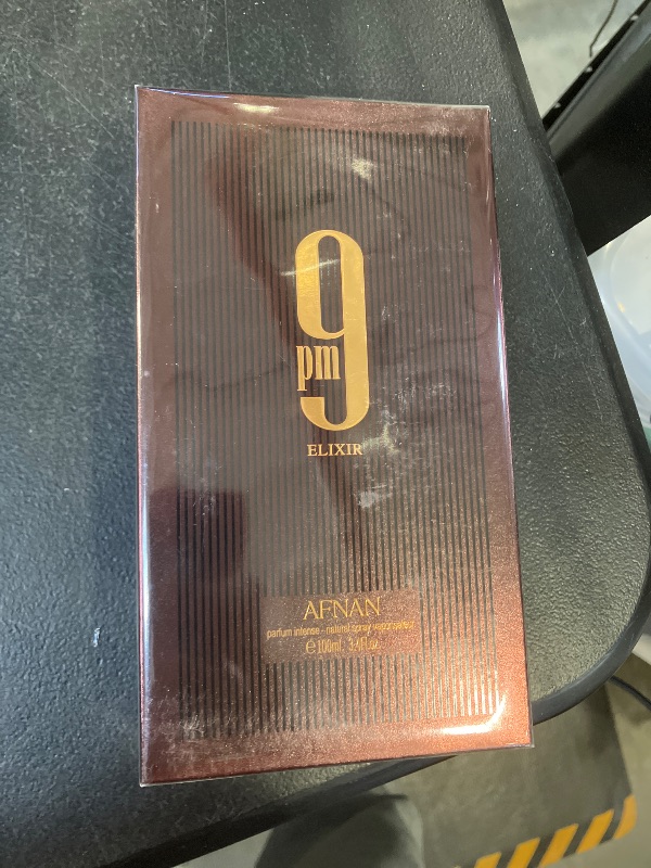 Photo 1 of Afnan 9 PM Elixir Unisex Extrait de Parfum, 3.4 Fl. Oz factory sealed