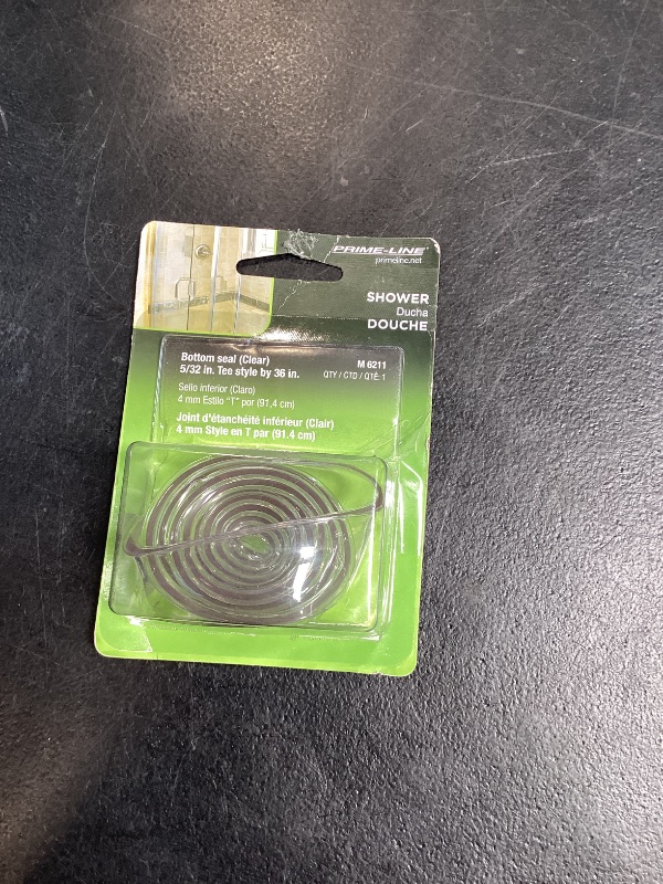 Photo 1 of Prime-Line M 6211 Shower Door Bottom Sweep, 36 In. x 1 In. Strip, Vinyl Construction, Clear, 5/32 In. Tee Insert Shape (Single Pack)