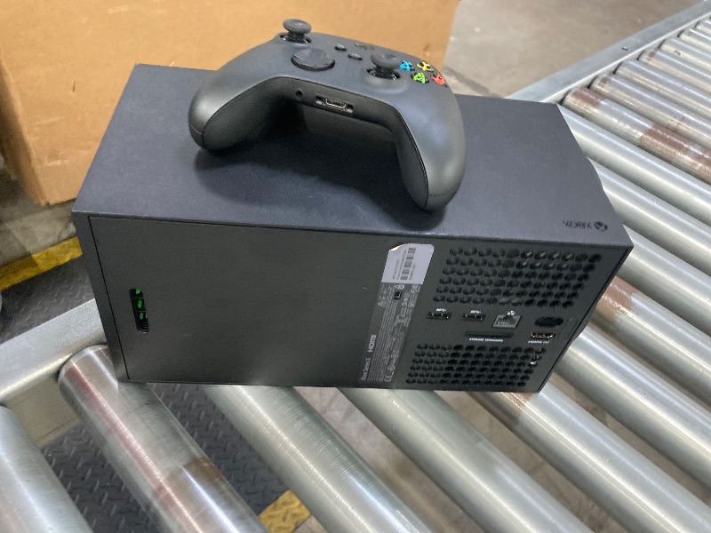 Photo 1 of ***its doesnt work, only use for parts, not return, not refund** Xbox Series X - Gaming Console - 1TB SSD - Includes Wireless Controller - 4K Gaming - 120FPS - Carbon Black