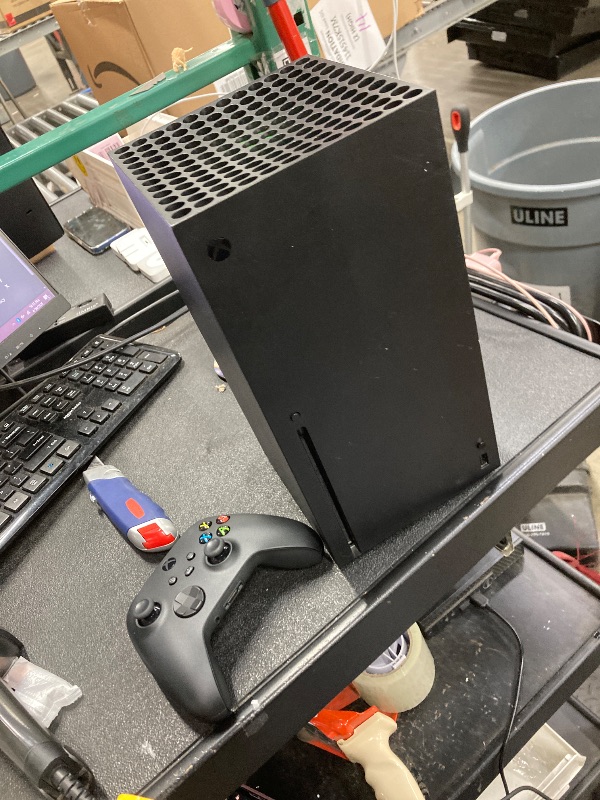 Photo 1 of ***its doesnt work, only use for parts, not return, not refund** Xbox Series X - Gaming Console - 1TB SSD - Includes Wireless Controller - 4K Gaming - 120FPS - Carbon Black