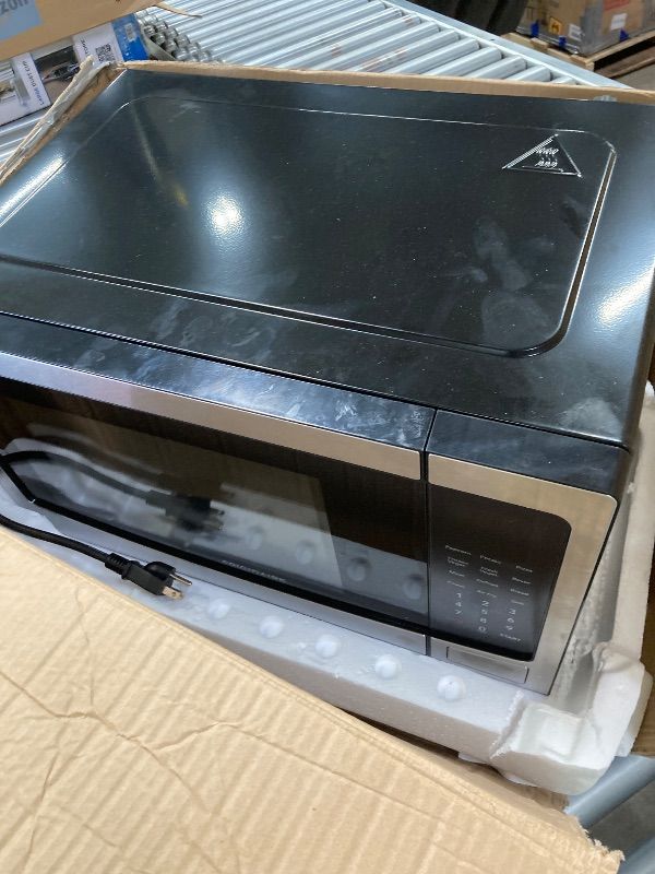 Photo 1 of ***DAMAGED DOOR SELLING AS PARTS ONLY*** FRIGIDAIRE 1.2 cu ft Microwave, Digital Air Fryer, Convection Oven, Combo-Fry with XL Capacity, Stainless Steel Finish