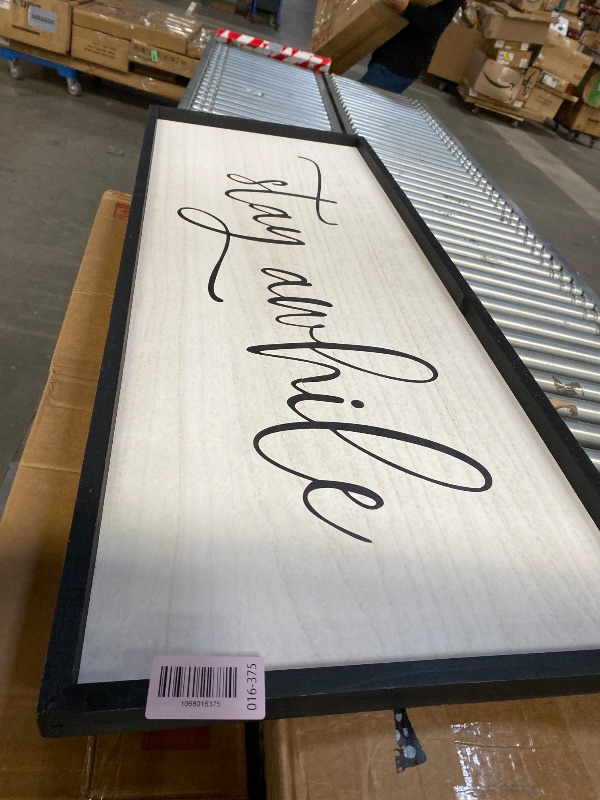 Photo 1 of ***DAMAGED -SELLING AS IS *** comurdyo Living Room Wall Decor Stay Awhile Sign 40"×15" Lets Stay Family Home Large Vintage Farmhouse Simple Wood Frame for Entryway Hallway Plaque Horizontal Art Hangin (Black) ***SOME SCUFFS, PAINT/WOOD CHIPS ALONG EDGE, N