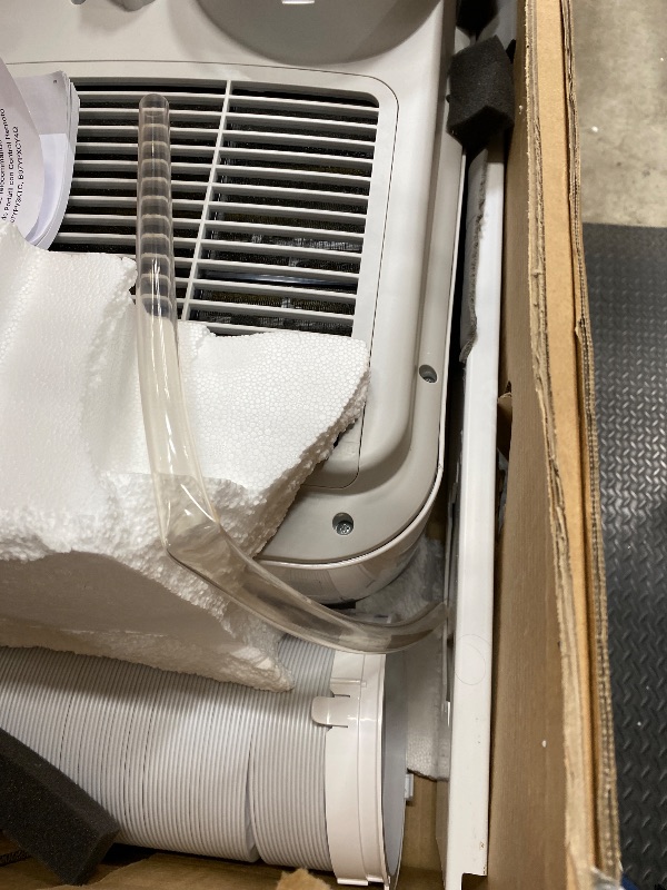 Photo 1 of **F1 CODE SHOWING**
Amazon Basics 3-In-1 Portable Air Conditioner with Follow Me Remote, Timer, Sleep Mode, Auto Swing, Dehumidifier, 12000 BTU (ASHRAE), Cools Up to 550 Sqf Bedroom, White