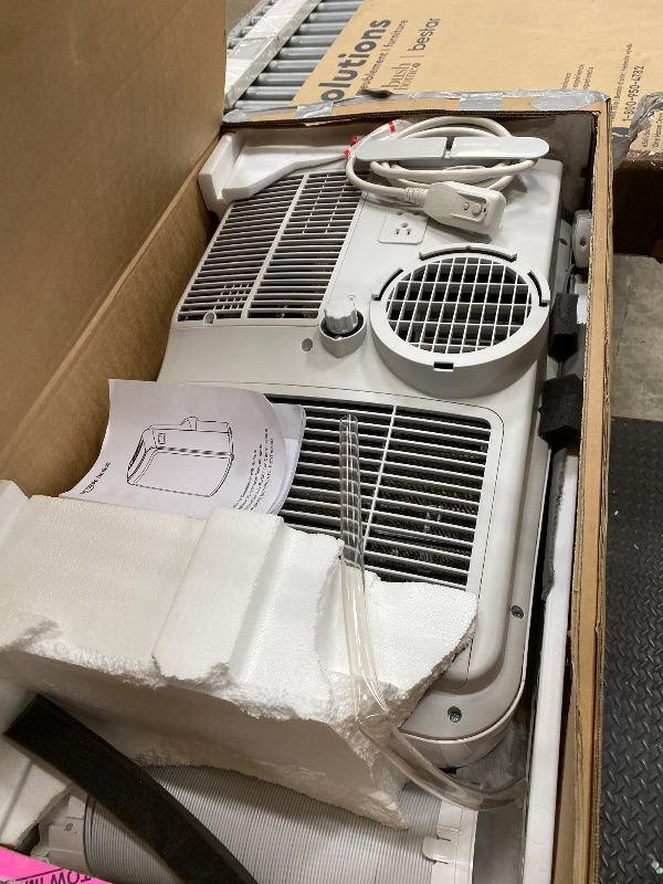 Photo 1 of **F1 CODE SHOWING**
Amazon Basics 3-In-1 Portable Air Conditioner with Follow Me Remote, Timer, Sleep Mode, Auto Swing, Dehumidifier, 12000 BTU (ASHRAE), Cools Up to 550 Sqf Bedroom, White