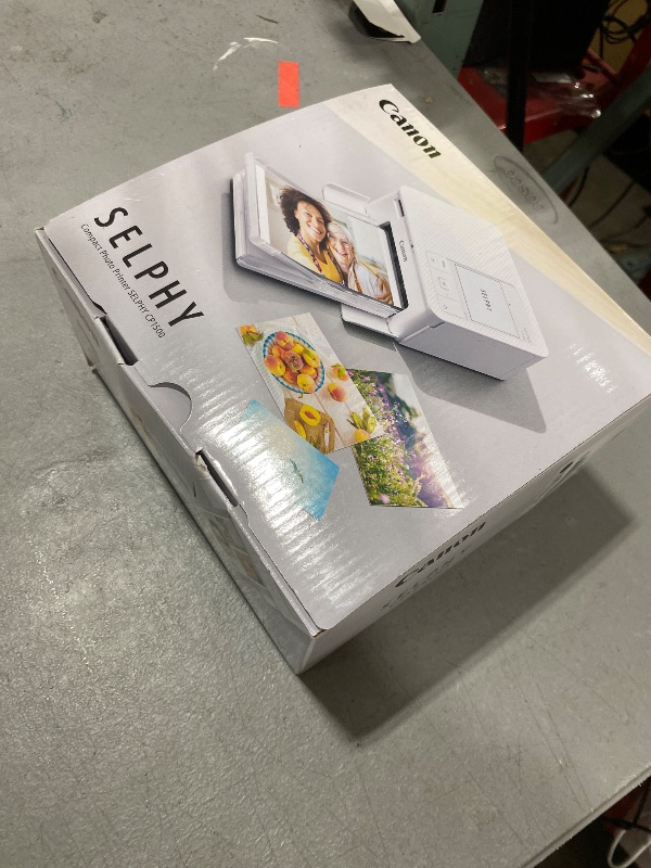 Photo 1 of Canon Selphy CP1500 Wireless Compact Photo Printer (Black)