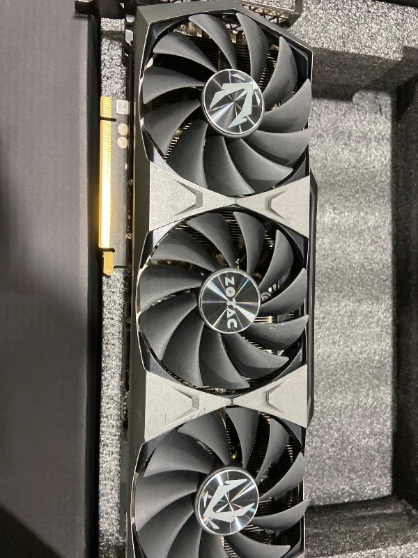 Photo 1 of NON FUNCTIONAL-- PARTS ONLY -------------ZOTAC Gaming GeForce RTX™ 3090 Trinity OC 24GB GDDR6X 384-bit 19.5 Gbps PCIE 4.0 Gaming Graphics Card, IceStorm 2.0 Advanced Cooling, Spectra 2.0 RGB Lighting, ZT-A30900J-10P
