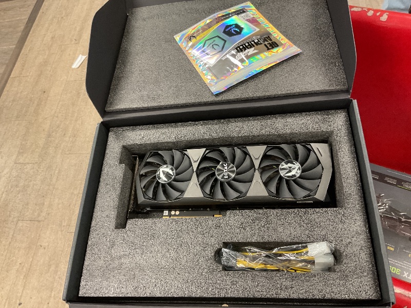 Photo 1 of NON FUNCTIONAL-- PARTS ONLY -------------ZOTAC Gaming GeForce RTX™ 3090 Trinity OC 24GB GDDR6X 384-bit 19.5 Gbps PCIE 4.0 Gaming Graphics Card, IceStorm 2.0 Advanced Cooling, Spectra 2.0 RGB Lighting, ZT-A30900J-10P