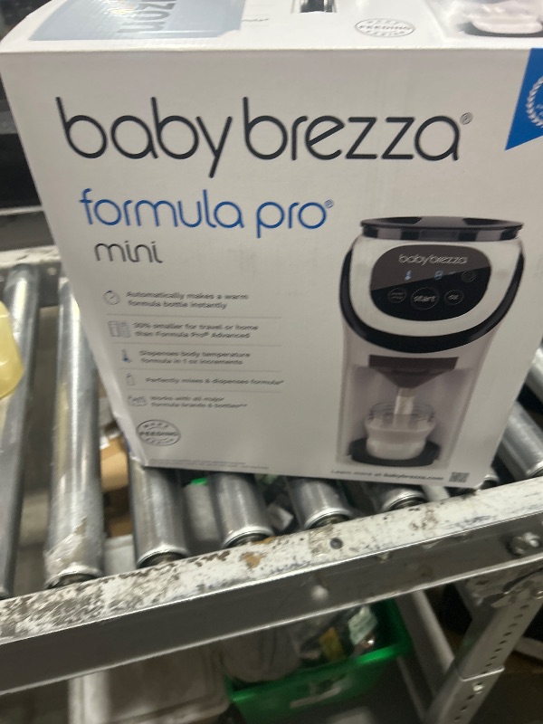 Photo 1 of Baby Brezza Formula Pro Mini Baby Formula Mixer Machine Fits Small Spaces and is Portable for Travel– Bottle Makers Makes The Perfect Bottle for Your Infant On The Go, White