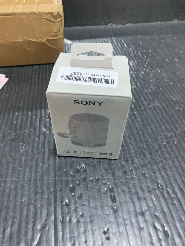 Photo 1 of Sony SRS-XB100 Wireless Bluetooth Portable Lightweight Super-Compact Travel Speaker, Durable IP67 Waterproof & Dustproof Shower Speaker, 16 Hr Battery, Versatile Strap, Hands-free Calling, Light Gray