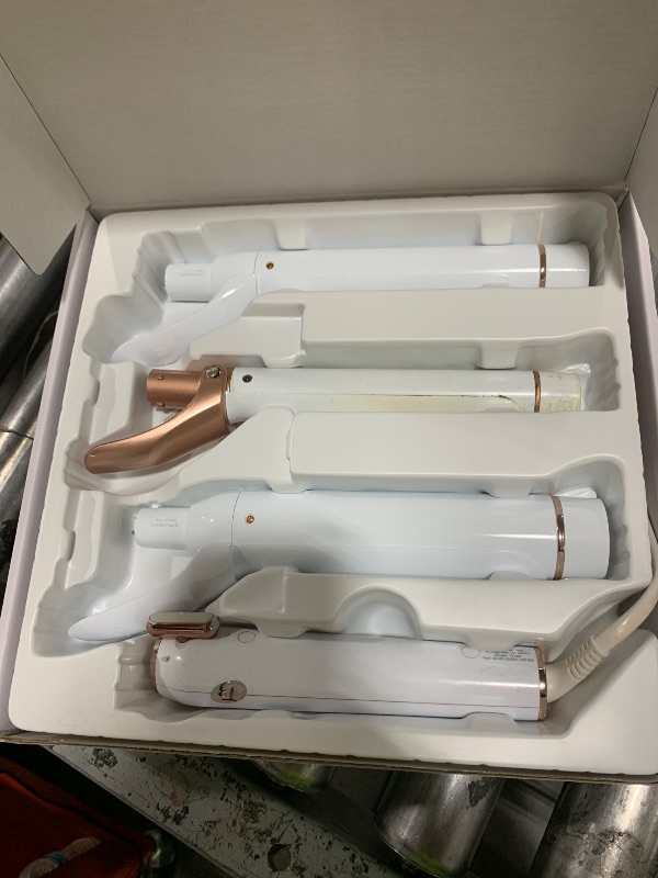 Photo 1 of T3 Switch Kit Classic Trio Professional Interchangeable Curling Iron with 3 Ceramic Clip Barrels for Curling and Waving, 9 Adjustable Heat Settings & Ion Generator