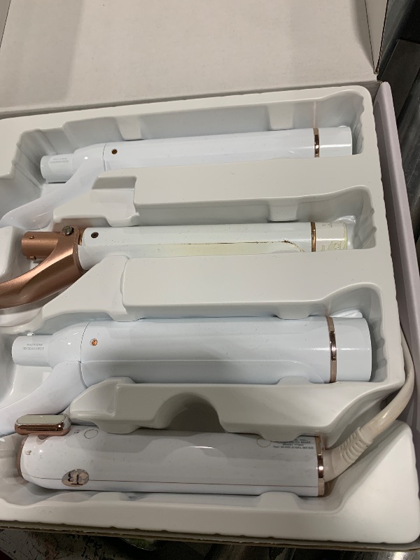 Photo 1 of T3 Switch Kit Classic Trio Professional Interchangeable Curling Iron with 3 Ceramic Clip Barrels for Curling and Waving, 9 Adjustable Heat Settings & Ion Generator