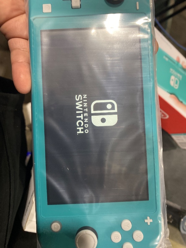Photo 1 of Nintendo Switch Lite - Turquoise