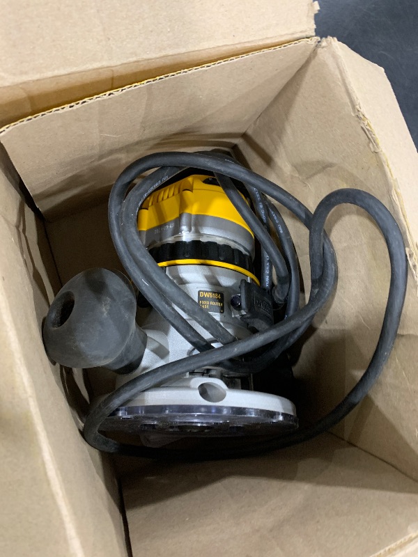 Photo 1 of DEWALT Router, Fixed Base, 12-Amp, 24,000 RPM Variable Speed Trigger, 2-1/4HP, Corded (DW618)