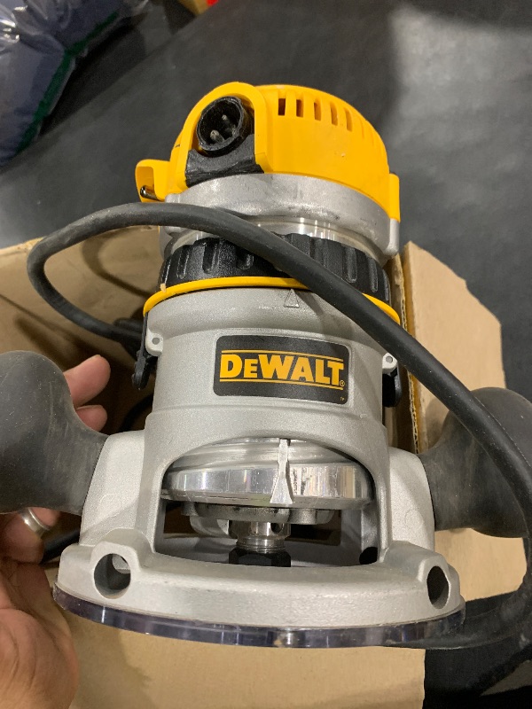 Photo 1 of DEWALT Router, Fixed Base, 12-Amp, 24,000 RPM Variable Speed Trigger, 2-1/4HP, Corded (DW618)