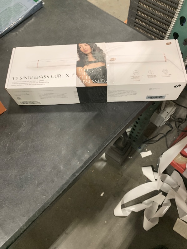 Photo 1 of T3 SinglePass Curl X Extra-Long Barrel 1", 1.25", 1.5" Curling Iron with 9 Heat Settings and Ceramic Barrel for Fast Styling and Lasting Results on All Hair Types
