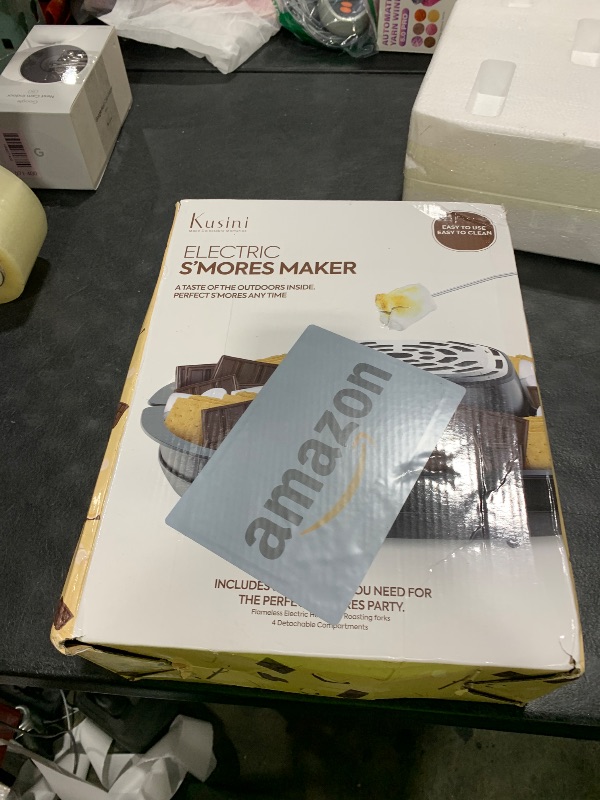 Photo 1 of Kusini Smores Maker Tabletop Indoor - Flameless Electric Marshmallow Roaster – 4 Detachable Trays & 4 Roasting Forks – Gift Set & Date Night Idea. Movie Night Supplies & Housewarming Gift