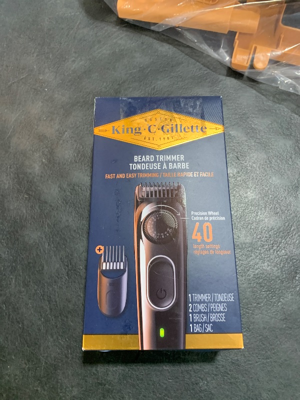 Photo 1 of King C. Gillette Cordless Beard Trimmer for Men, Kit includes 1 Trimmer, 3 Interchangeable Combs, 1 Cleaning Brush, 1 Charger, 1 Travel Bag, BLUE