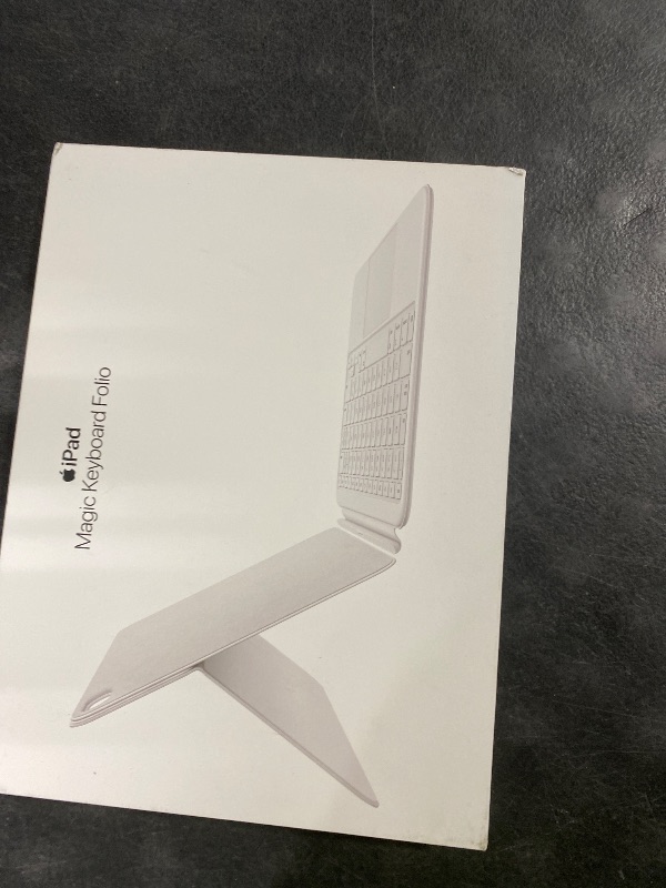 Photo 1 of Apple Magic Keyboard Folio: iPad Keyboard and case for iPad (A16 and 10th Generation), Detachable Two-Piece Design That attaches magnetically, Built-in trackpad, US English – White