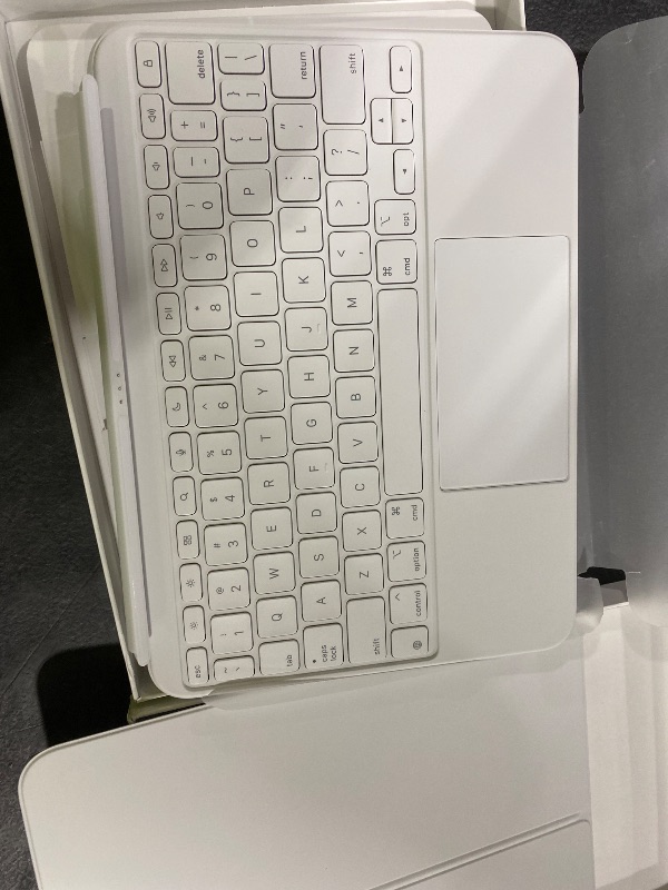 Photo 1 of Apple Magic Keyboard Folio: iPad Keyboard and case for iPad (A16 and 10th Generation), Detachable Two-Piece Design That attaches magnetically, Built-in trackpad, US English – White