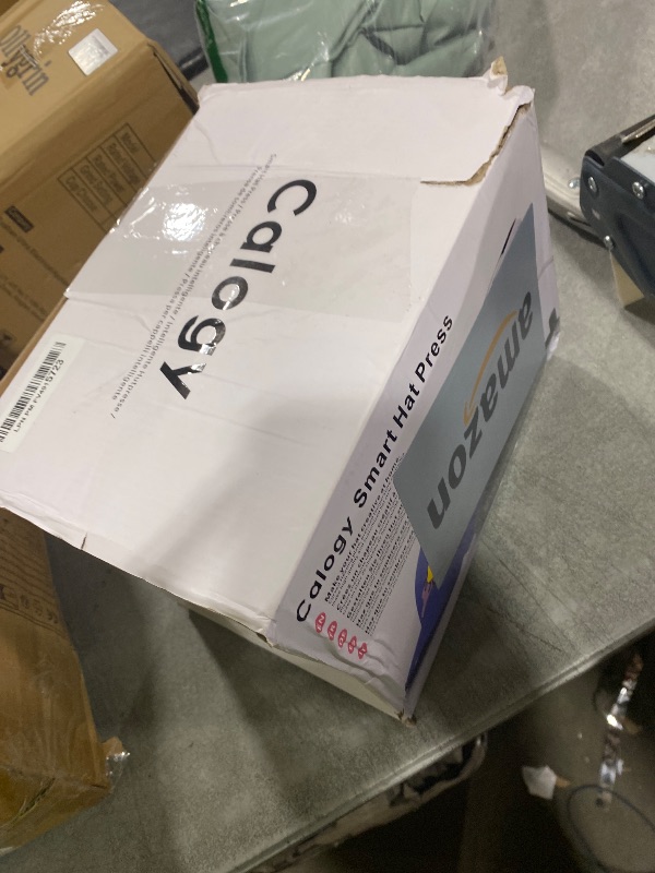 Photo 1 of Calogy Hat Press Heat Machine for Caps, Mini Portable Hat Heat Press with Timer, Max 410?,Precision Temp Control ±5?, Fast & Evenly Heating 2.76*6.3in Curved Plate for 6 1/2-8 hat?21-26 Girth (Blue)