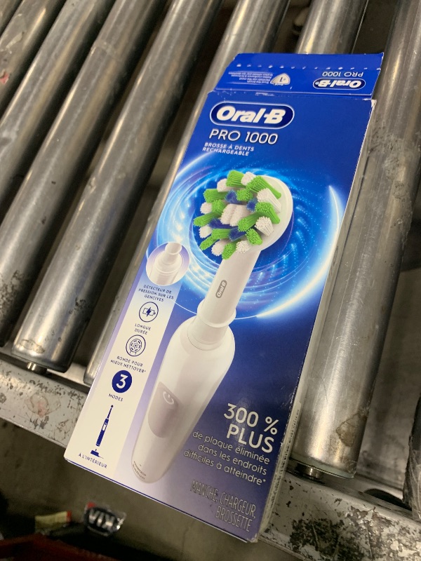 Photo 1 of Oral-B Pro 1000 Rechargeable Electric Toothbrush, White