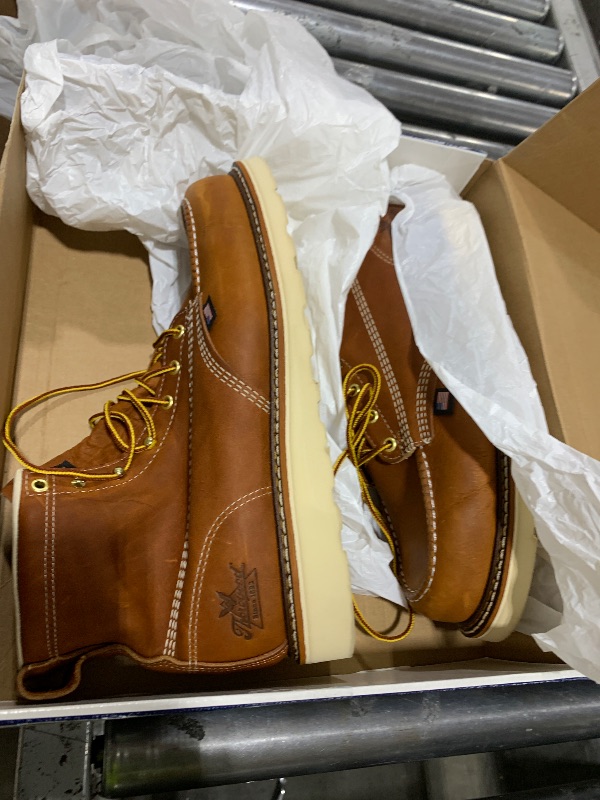 Photo 1 of Thorogood American Heritage 6” Moc Toe Work Boots for Men - Soft Toe, Premium Full-Grain Leather with Slip-Resistant Wedge Outsole and Comfort Insole; EH Rated, Tobacco - 11.5 2E