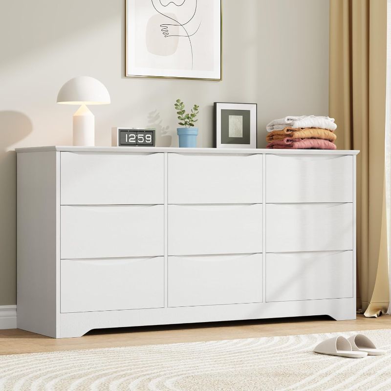 Photo 1 of Garvee Wooden Dresser with 9 Drawers, Tall Modern Closet with Deep Storage, Large Chest of Drawers with Wide Top, Long Storage Dresser for Bedroom, Living Room, Hallway, Kids Room, White