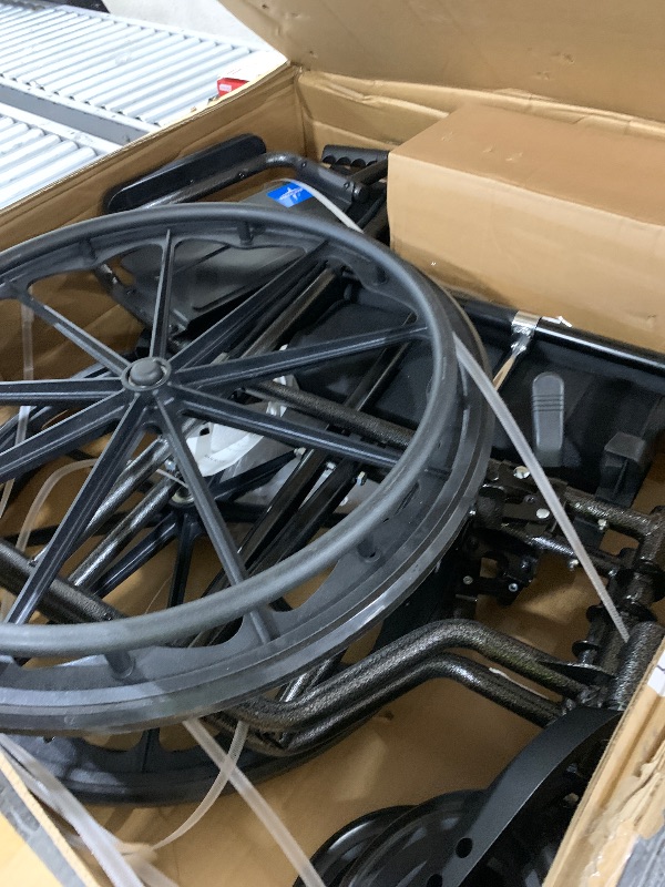 Photo 1 of Medline Comfortable Folding Wheelchair with Swing-Back, Desk-Length Arms and Elevating Footrests, 16”W x 16”D Seat