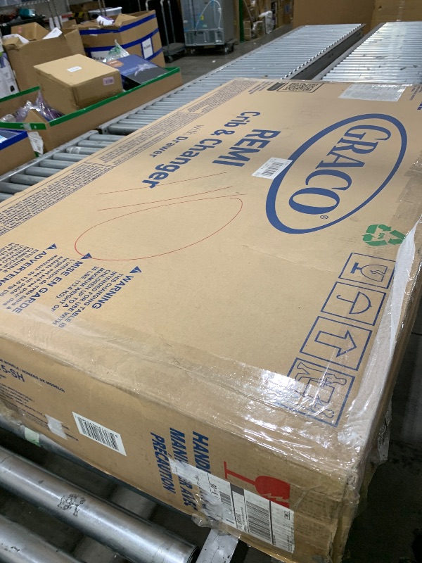 Photo 1 of Graco Remi 4-in-1 Convertible Crib & Changer – GREENGUARD Gold Certified, Fits Standard Crib Mattress, Converts to Toddler Bed and Full Bed, 4 Adjustable Mattress Heights (Natural and White)