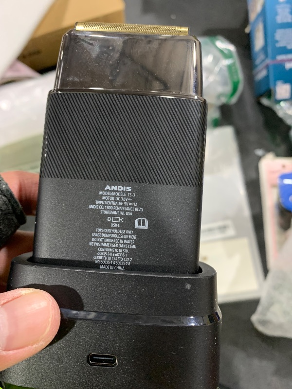 Photo 1 of Andis 563616 Pro Foil Plus II Cordless Shaver, Gold Titanium Foils, Lithium Ion Battery, Includes USB-C Charging Stand, Black