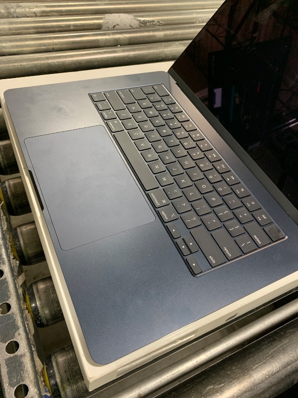 Photo 1 of Apple 2025 MacBook Air 15-inch Laptop with M4 chip: Built for Apple Intelligence, 15.3-inch Liquid Retina Display, 24GB Unified Memory, 512GB SSD Storage, 12MP Center Stage Camera, Touch ID; Midnight