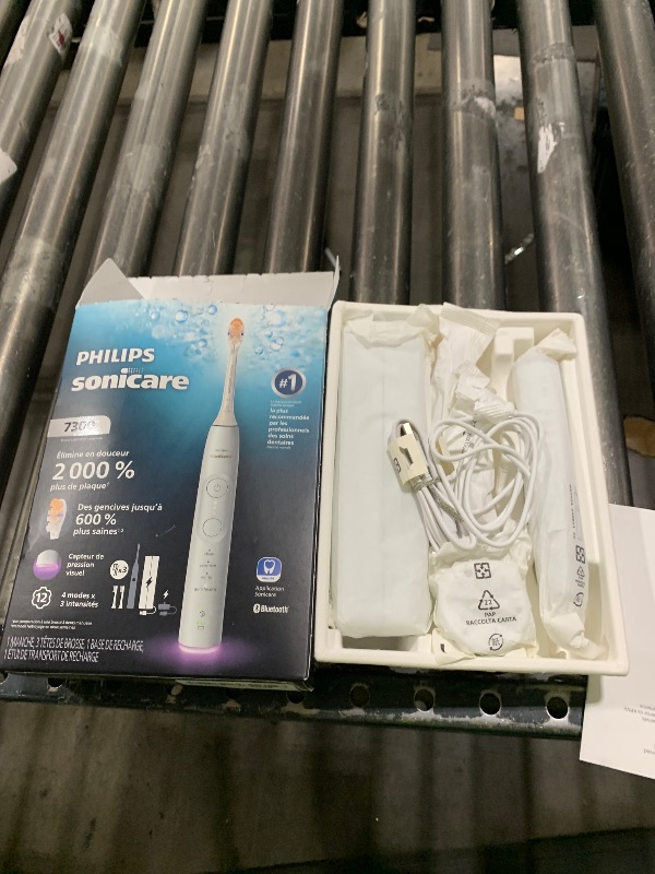 Photo 1 of Philips Sonicare 7300 Series Electric Toothbrush - Next-Generation Sonicare Technology, Pressure Sensor, 12 Brushing Settings, SmarTimer, BrushPacer, 21-Day Runtime, Travel Case, White, HX7420/07