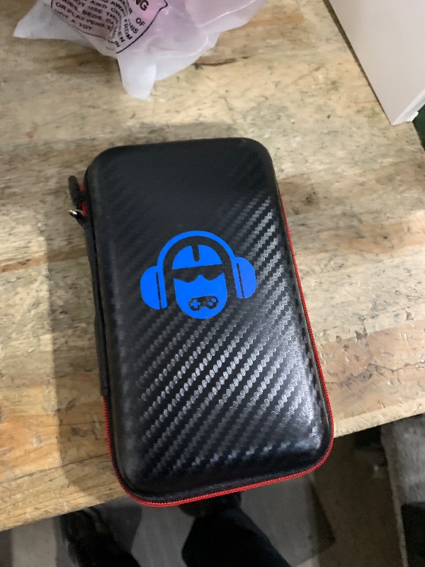 Photo 1 of ?R36MAX 4000mAh Portable Rechargeable Handheld Retro Game Console,Comfort Non-Slip Handheld Standing Retro Game Console with 64G TF Car,4.0-inch Screen,for Office,Black