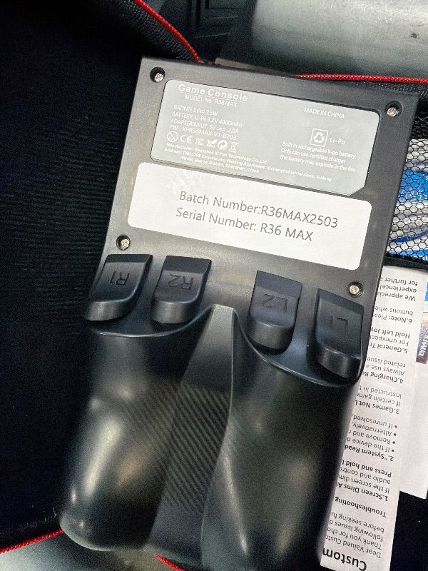 Photo 1 of ?R36MAX 4000mAh Portable Rechargeable Handheld Retro Game Console,Comfort Non-Slip Handheld Standing Retro Game Console with 64G TF Car,4.0-inch Screen,for Office,Black