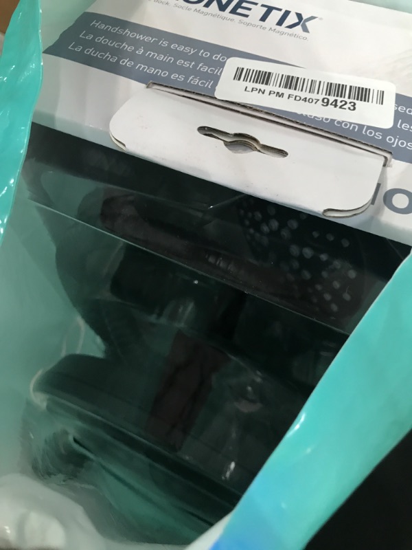 Photo 1 of Moen Engage Matte Black 2.5 GPM Handheld Showerhead and Rain Shower 2-in-1 Combo Featuring Magnetic Docking System and Metal Hose, 26009BL