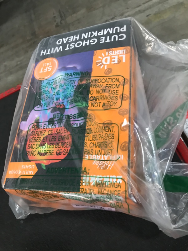 Photo 1 of *** used**** zukakii 5FT Halloween Inflatables Pumpkin Ghost Built-in 3-Pattern Colorful Flashing Light, Cute Halloween Blow Up Yard Decorations for Indoor Outdoor Home/Holiday/Party/Yard/Lawn (1PCS)