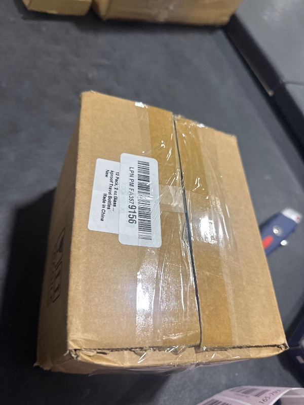 Photo 1 of 12 Pack, 2 oz Glass Eye Dropper Bottles w/ 3 Stainless Steel Funnels & 1 Long Pipette Dropper & 24 Labels - 60ml Clear Tincture Bottles for Essential Oils, Liquids - Leakproof Travel Essential Bottles