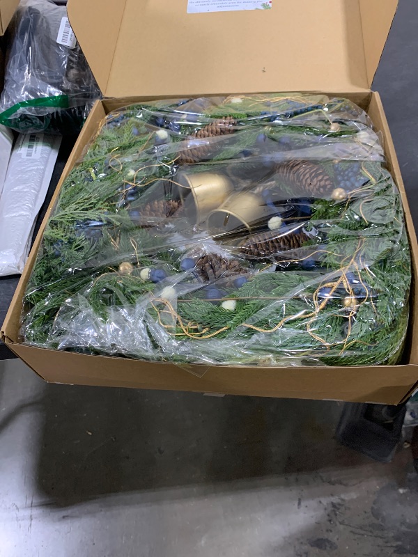 Photo 1 of 24 Inch Pre- Norfolk Pine Christmas Wreath for Front Door, Artificial Plants Green Christmas Wreath with Lights, Velvet Ribbon, Natural Berries, Pinecones and Bells, Lighted Door Wreath