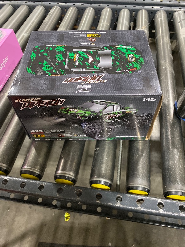 Photo 1 of 1:18 Scale All Terrain RC Cars, 40 KPH High Speed 4WD Electric Vehicle with 2.4 GHz Remote Control, 4X4 Waterproof Off-Road Truck with Two Rechargeable Batteries