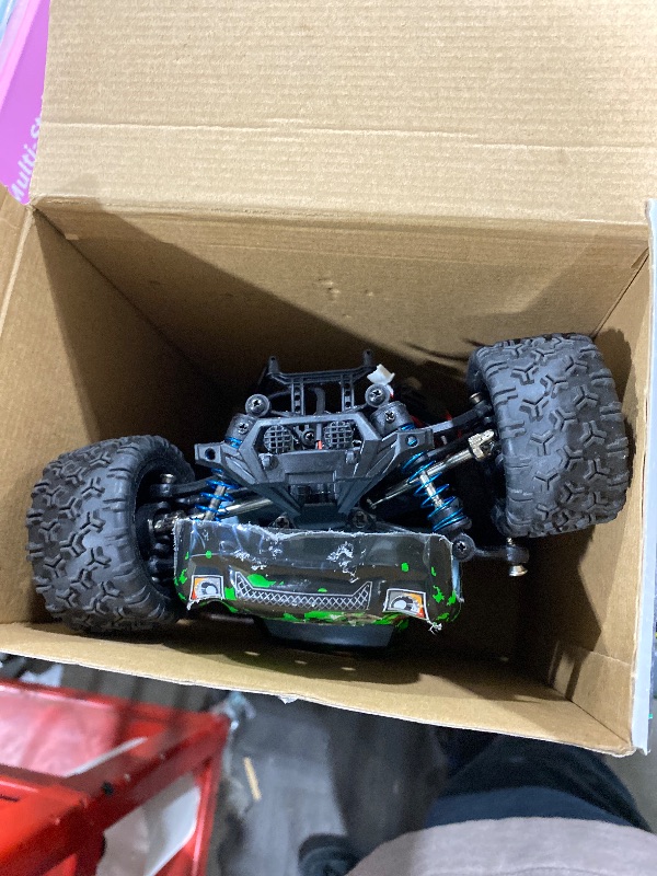 Photo 1 of 1:18 Scale All Terrain RC Cars, 40 KPH High Speed 4WD Electric Vehicle with 2.4 GHz Remote Control, 4X4 Waterproof Off-Road Truck with Two Rechargeable Batteries