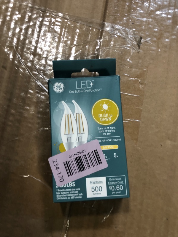 Photo 1 of ******ONE LIGHT BULB IS BROKEN*****GE LED+ Dusk to Dawn LED Light Bulbs, Automatic On/Off Outdoor Security Lights, Soft White, E12 Candelabra Base (2 Pack)