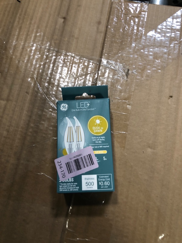 Photo 1 of ******ONE LIGHT BULB IS BROKEN*****GE LED+ Dusk to Dawn LED Light Bulbs, Automatic On/Off Outdoor Security Lights, Soft White, E12 Candelabra Base (2 Pack)